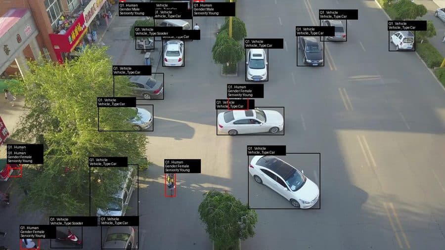 Aerial video annotation in LabelFort with bounding boxes and attribute labels on vehicles and pedestrians across a street scene